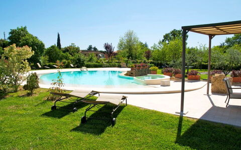 Pieve di Sant Ippolito: Water, Plant, Sky, Building, Swimming Pool, Azure, Tree, Shade, Outdoor Furniture, Grass