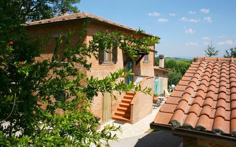 Podere San Bono: Building, Sky, Plant, Window, House, Cloud, Tree, Cottage, Wood, Landscape