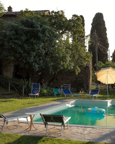 Olivo: Water, Plant, Sky, Green, Swimming Pool, Tree, Shade, Outdoor Furniture, Grass, Building