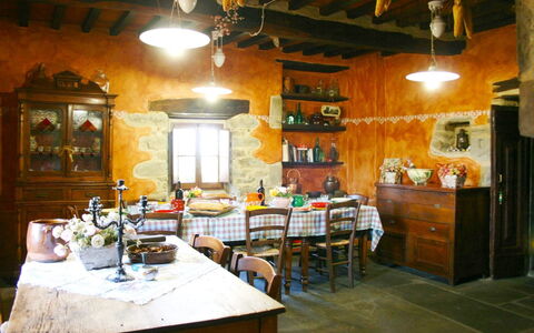 Torre di Vignale: Building, Room, Property, Restaurant, Furniture, Interior Design, Table, Beam