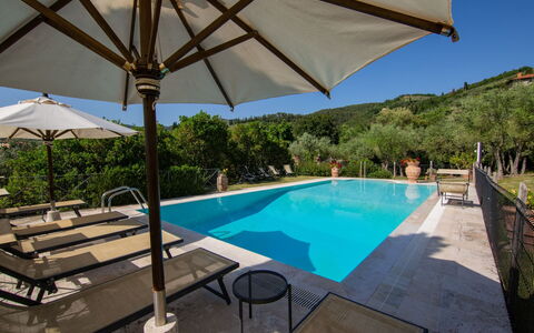Villa degli Olivi: Water, Building, Sky, Property, Furniture, Plant, Swimming Pool, Table, Azure, Umbrella