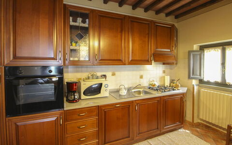 Agriturismo Ca di Vestro: Kitchen, Kitchen Appliance, Major Appliance, Countertop, Cabinetry, Wood, Furniture, Interior Design, Flooring, Kitchen Stove