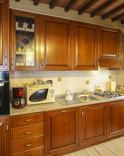 Agriturismo Ca di Vestro: Kitchen, Kitchen Appliance, Major Appliance, Countertop, Cabinetry, Wood, Furniture, Interior Design, Flooring, Kitchen Stove
