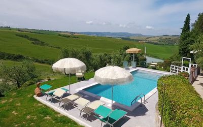 Palazzo Conti: Cloud, Sky, Plant, Umbrella, Water, Outdoor Furniture, Swimming Pool, Tree, Land Lot, Shade