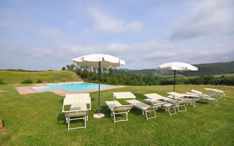 Villa Gaeta: Property, Table, Sky, Real Estate, Furniture, Grass, House, Folding Chair, Tree, Estate