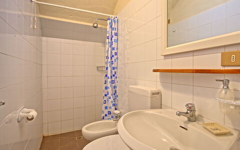 Casa Catia: Bathroom, Property, Room, Tile, Tap, Wall, Plumbing Fixture, Bathroom Accessory, Interior Design, Architecture