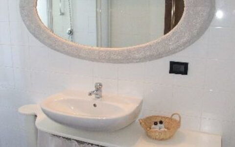 Villa Il Castagno: Bathroom, Mirror, Property, Room, Bathroom Sink, Bathroom Cabinet, Bathroom Accessory, Sink, Toilet, Plumbing Fixture